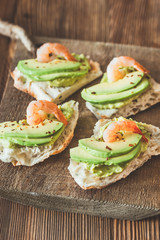 Sandwiches with avocado and shrimps
