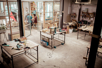 Carpenters working in workshop