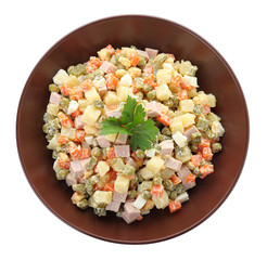 Delicious salad Olivier on white background, top view