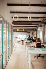 Carpenters working in office at workshop