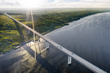 "President" bridge over Volga river in Ulyanovsk, Russia aerial view at sunset