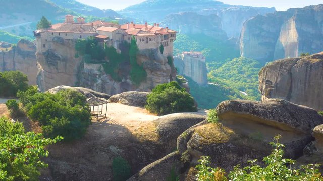 The Holy Monastery of Varlaam on the top of the cliff in Meteora in the morning, Greece -  4k Greek landscape