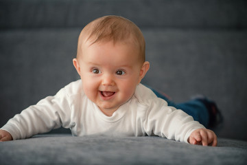 Naklejka premium Cute smiling baby girl 