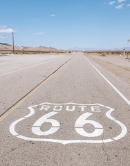Route 66 sign on empty desert, Amboy in California, USA
