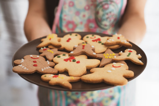 Serving traditional gingerbread cookies for new year celebration
