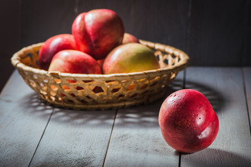 Fresh fruit nectarines healthy food.Harvest red and fresh nectarines . Pile of sweet fruits