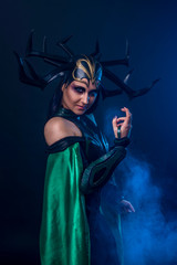 beautiful woman in halloween cosplay costume.  goddess of death 