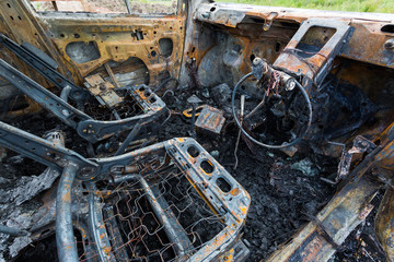 The interior of a burnt out car