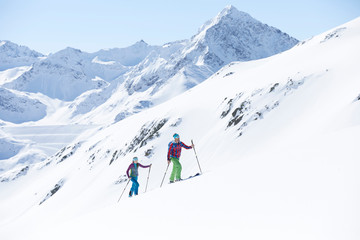 Fototapeta na wymiar Couple ski touring in the mountains, Kuehtai, Tyrol, Austria