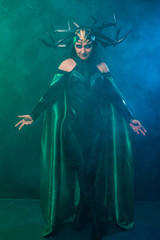 beautiful woman in halloween cosplay costume.  goddess of death 