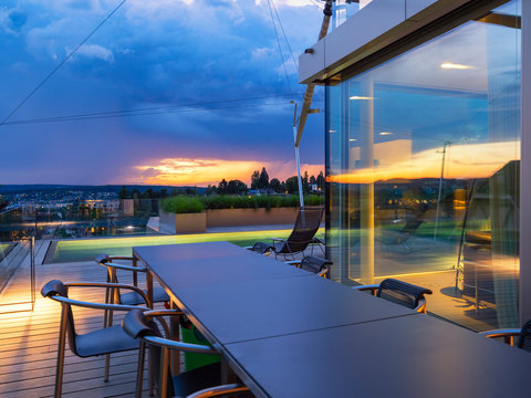 Switzerland, view from terrace of modern villa at sunset