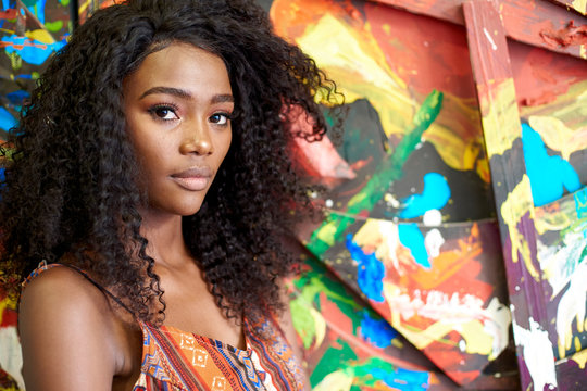 Portrait of young African woman in a cafe