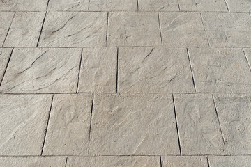 Fondo de pavimento de hormigón impreso con textura irregular