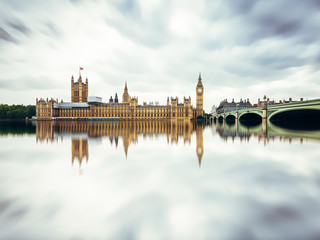 Panoramic view of Houses of Parliament, Big Ben and Westminster Bridge with reflection, London