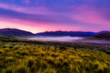 Fototapeta premium Early morning fog at dawn in the Ashburton high country Southern alps