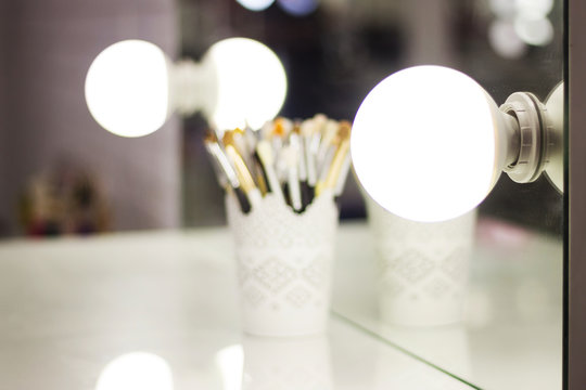 Make up mirror with light bulbs, backstage makeup room, selective focus