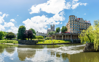 The Pulteney Bridge in Palladian style crosses the River Avon in Bath
