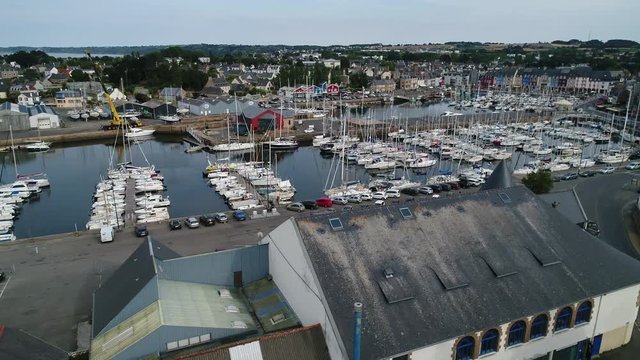 Aerial view. Parking for boats and yachts in the Marina closed at low tide in the town of Paimpol in Northern France, in Brittany.