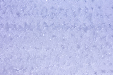 Unusual ice patterns close up. Light purple tinted photo. Background for website or layout.