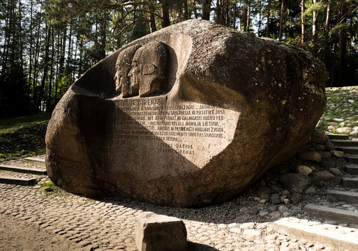 Puntukas boulder near Anyksciai, Lithuania with carved pilots Darius and Girėnas in memory of their flight in 1933