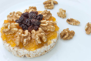  Rice biscuit with papaya candy, nuts and raisins.