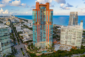 Aerial photo pink Portofino Tower Miami Beach iconic architecture adjacent to South Pointe Park