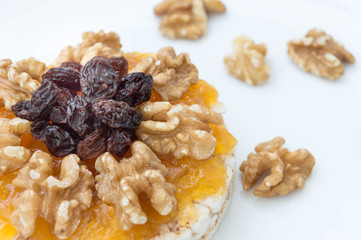  Rice biscuit with papaya candy, nuts and raisins.