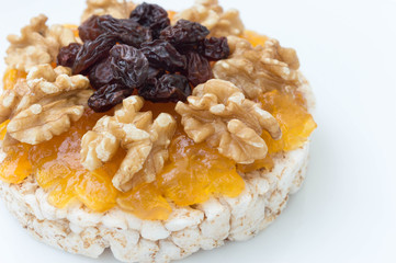  Rice biscuit with papaya candy, nuts and raisins.
