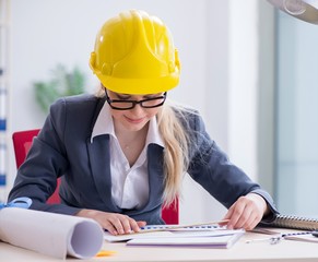 Woman architect working on the project