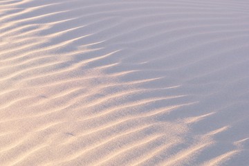 Sand dunes and ripples in the desert on a clear, sunny day