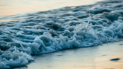 Fototapeta na wymiar Close up wave on the beach