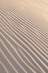 Sand ripples in the desert on a clear, sunny day