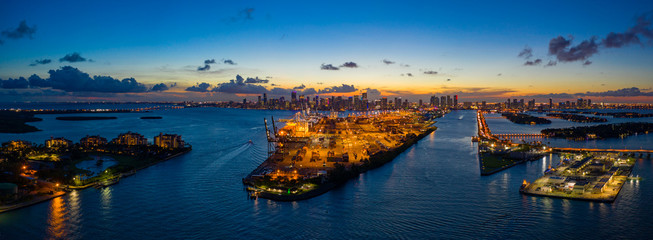 Naklejka premium Beautiful colorful sunset over Port of Miami shot with aerial drone