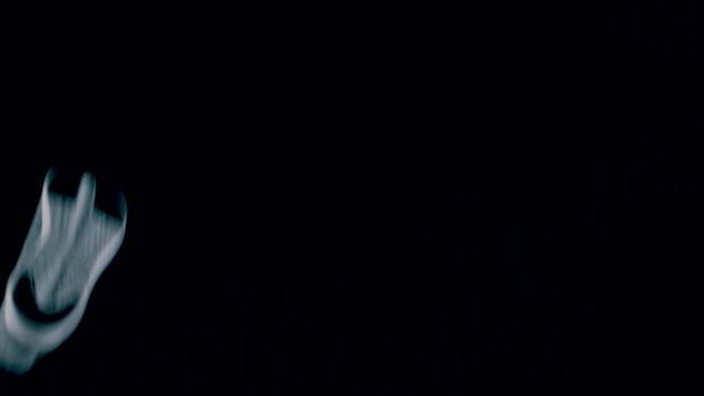 many pairs of sneakers in the air