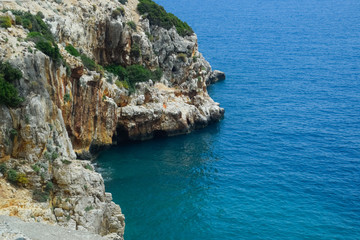 Coastal cliffs of limestone. The coast of Mediterranean Sea in Turkey.