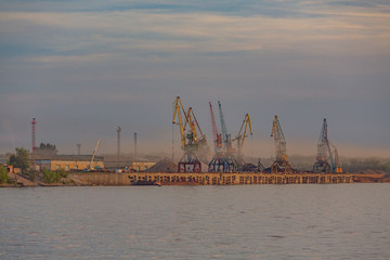 Samara, cargo port and Volga embankment at sunset