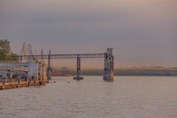 Samara, cargo port and Volga embankment at sunset