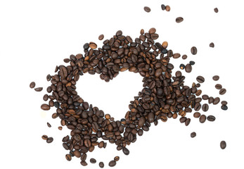 Group of arabica coffee beans with white hearth shape on center. isolated on  white background
