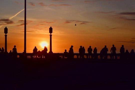 Group watching sunset- Seaside, Oregon 2