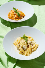 Menu photography: top view of different restaurant meals on bright cloth background