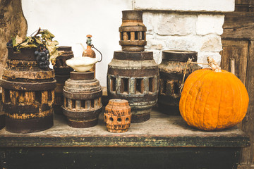 Autumn Pumpkin Thanksgiving and Halloween Background - orange pumpkins over wooden table. Toned Image.