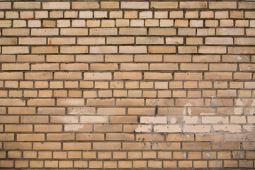 Brick wall with color spots