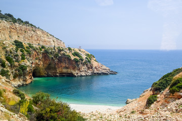 Coastal cliffs of limestone. The coast of Mediterranean Sea in Turkey.