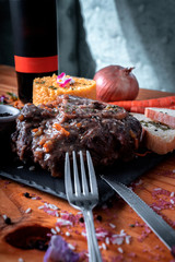 Italian Risotto With Side Beef Stake and Red Wine Bottle