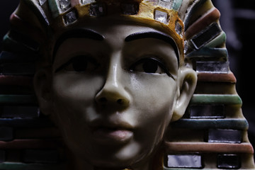 Pharoah statue face close-up.