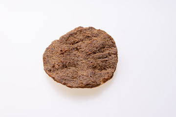 Dried vegan patty isolated on white background