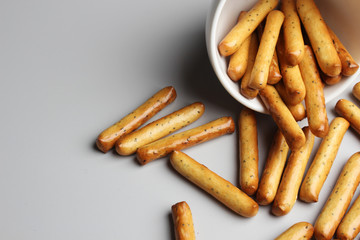 breadsticks glassware gray background