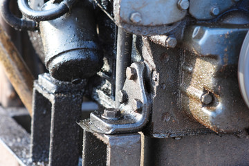 some partial of old and dirt machine.