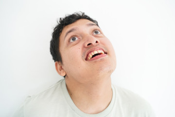 Obraz premium Portrait of smiling disable asian men standing on white background