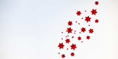 christmas background of red stars on a white background